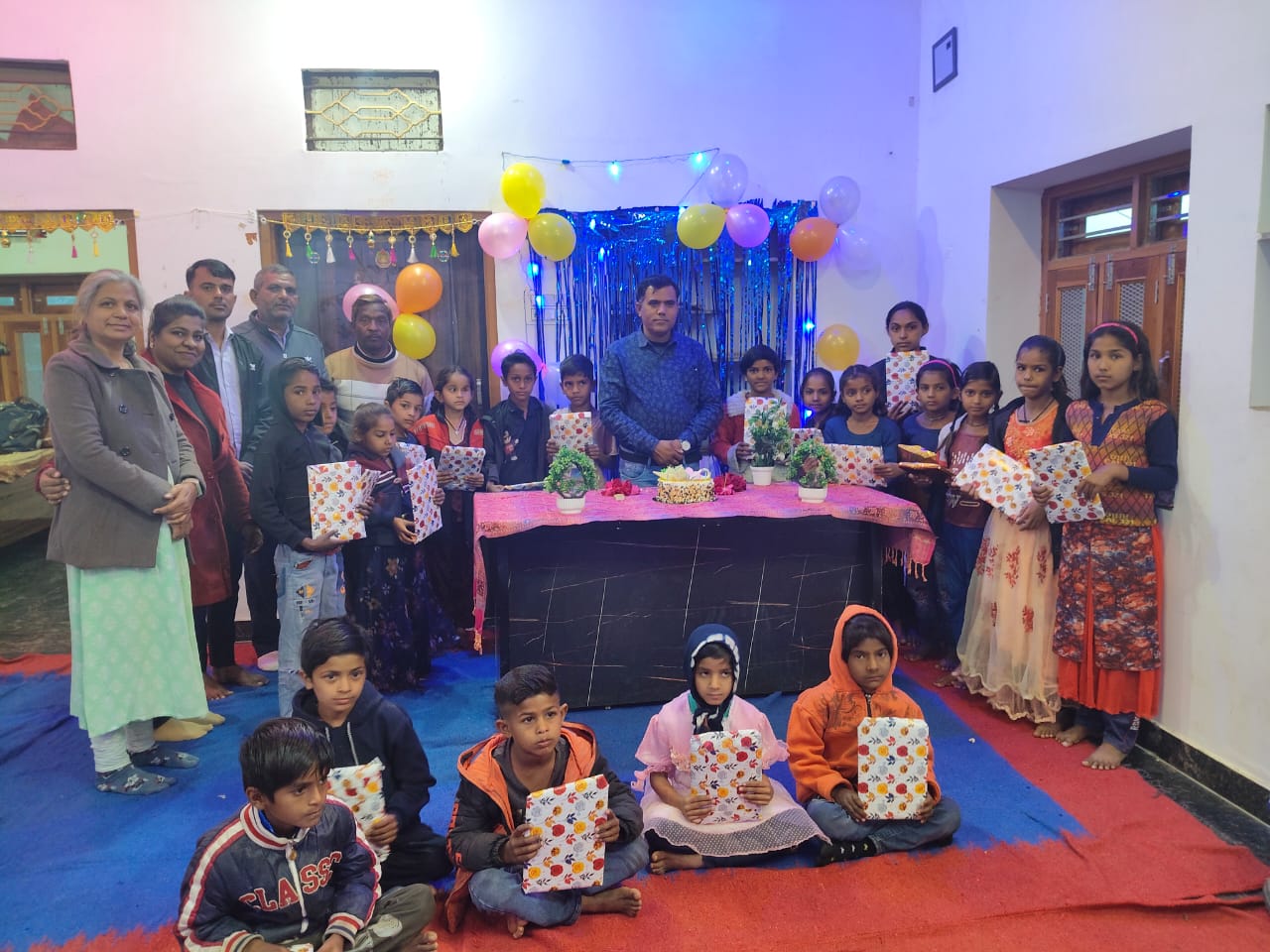 Celebrating the team's birthday with children